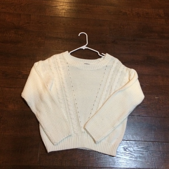 White sweater.