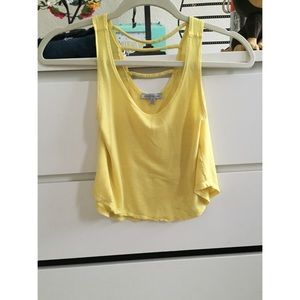 a yellow crop top