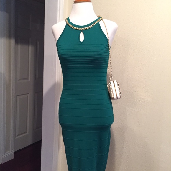 XOXO Dresses & Skirts - Forrest green bandage dress
