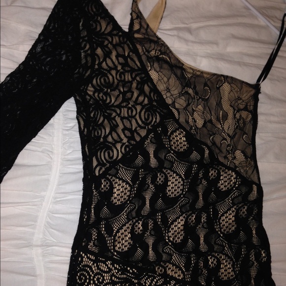 Black lace Bebe one sleeve dress.