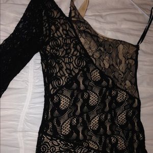 Black lace Bebe one sleeve dress.