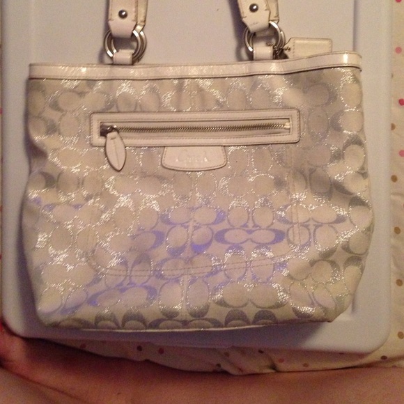 White coach bag with silver C's