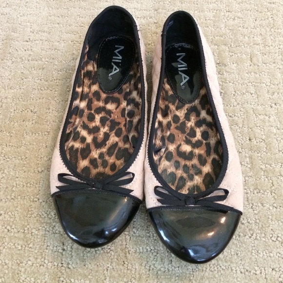 Nude and black ballet flats