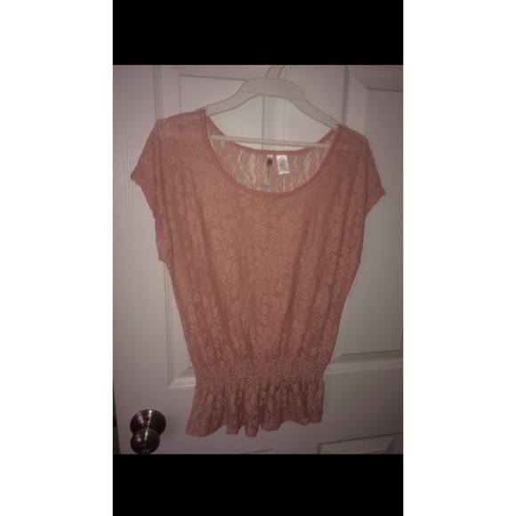 Pink lace shirt.