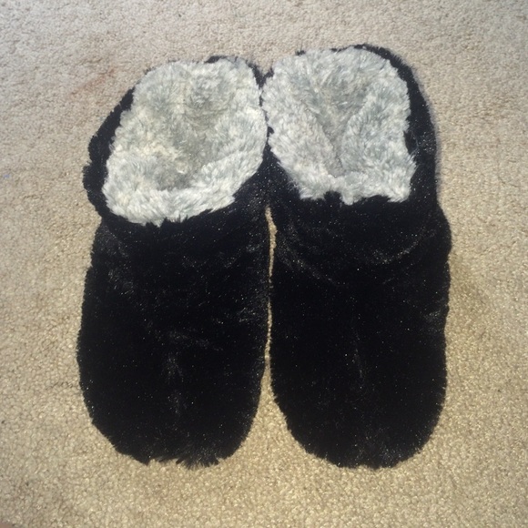 Black and fuzzy indoor boots