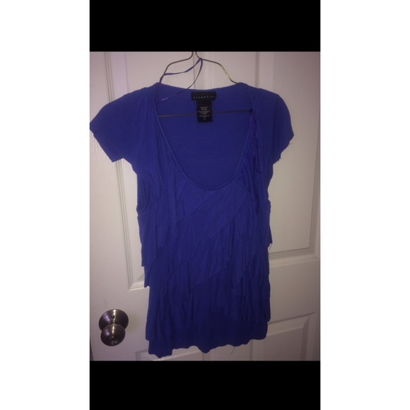 Blue Ruffled shirt.