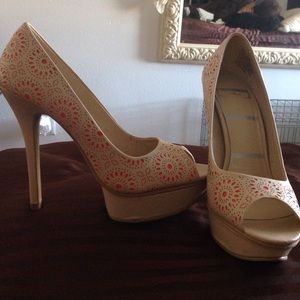 Elle flower cutout heels.