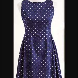 Beautiful navy blue and polka dot Eva mendes dress