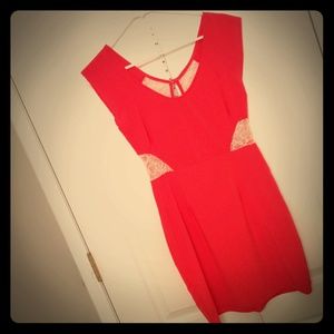 NWOT. Coral with lace side/back short dress.