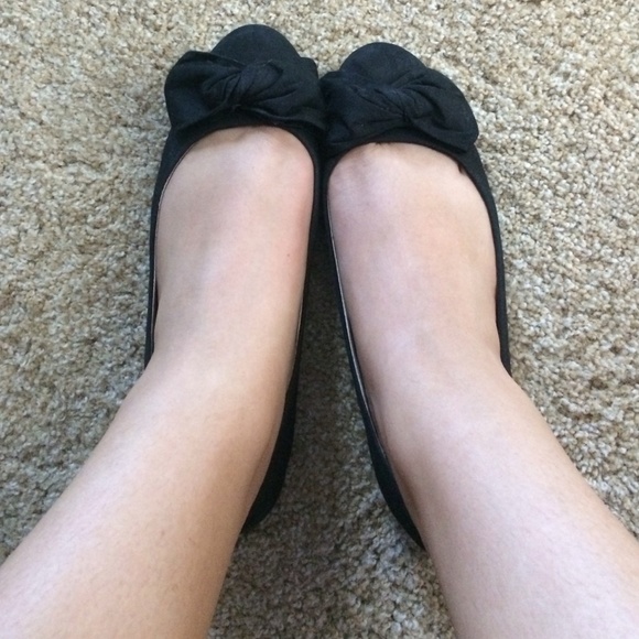 Black flats with a bow