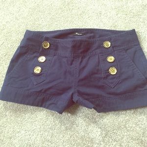 Navy Express shorts with gold buttons