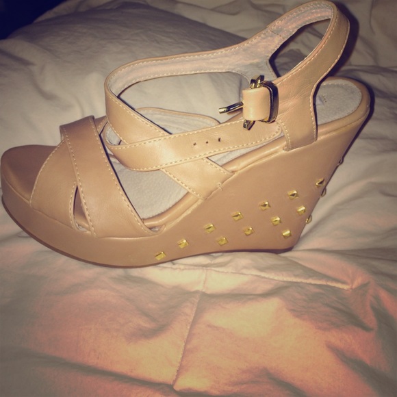 Never worn wedged heels!