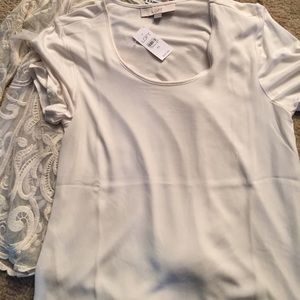 A brand new Loft XS cream V neck blouse