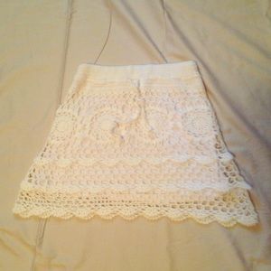 Super soft white knit skirt with lining.