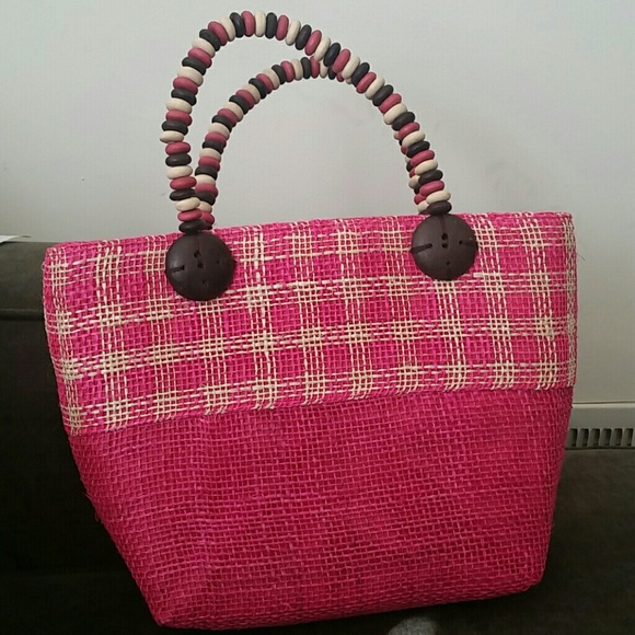 Pink woven shoulder bag