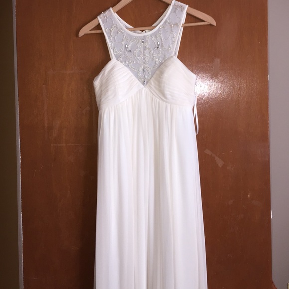 Gorgeous beige evening gown with beading work