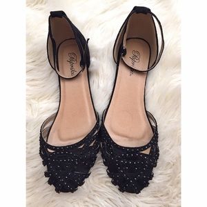 Black studded flats