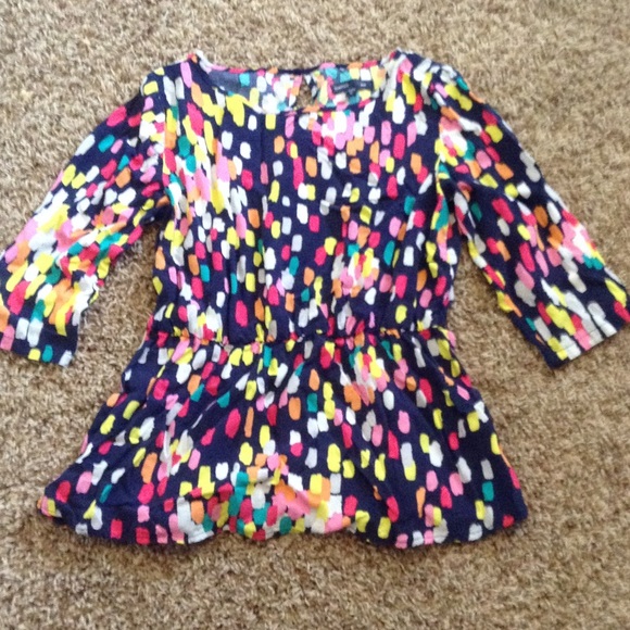 a peplum sort of shirt