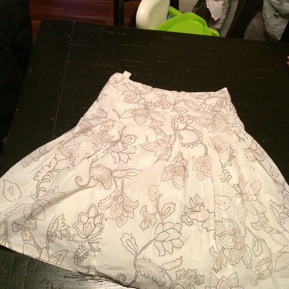 Cream a line skirt with floral pattern