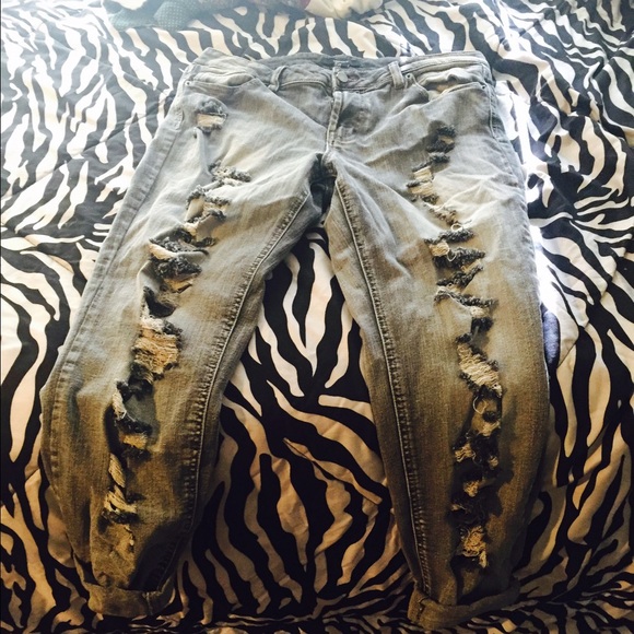 ripped baggy jeans .