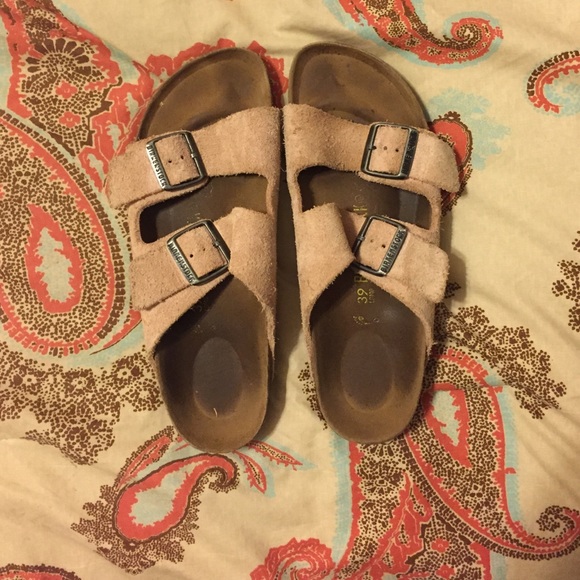 worn pale pink Birkenstocks