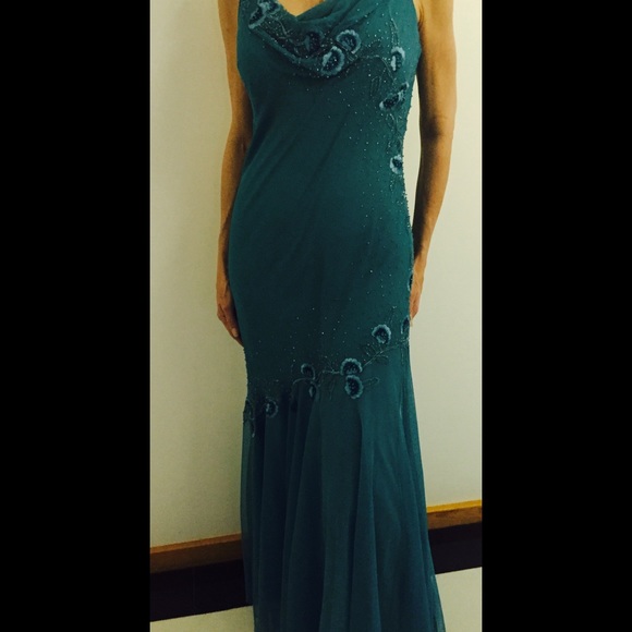 A teal silk beaded embroidered gown by Joanna Chen