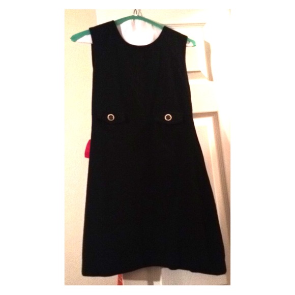 All black sleeveless bebe dress.