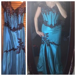 Jovani floor length gown with lace appliqués