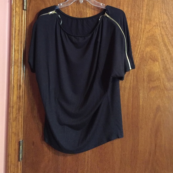 Black top with gold zipper sleeves