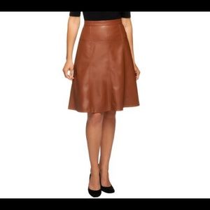 Faux Leather gored skirt Color: Cognac