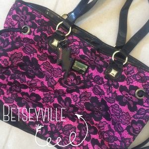 Betseyville pink and black faux lace bag