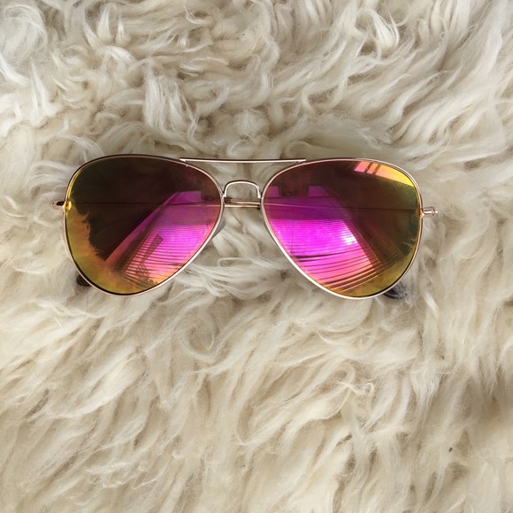 Iridescent mirrored orange and purple sunglasses