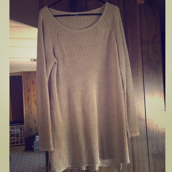 Long tan sweater. Great with leggings!
