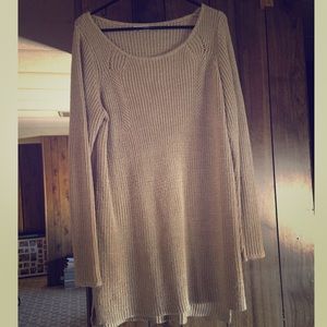 Long tan sweater. Great with leggings!