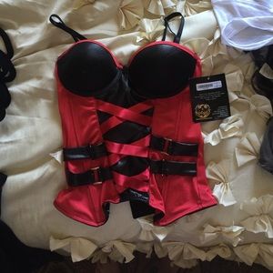 Red and back pleather bustier. Never worn