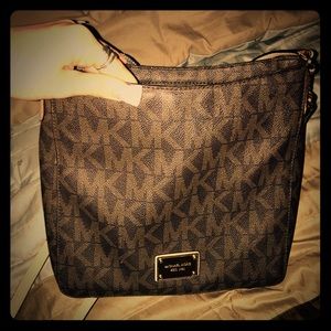 Micheal Kors satchel cross body.