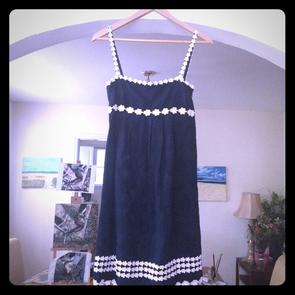 Navy dress with white flower spaghetti straps