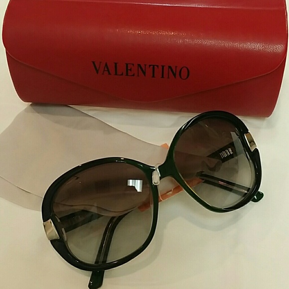 Valentino sunglasses in very dark green.