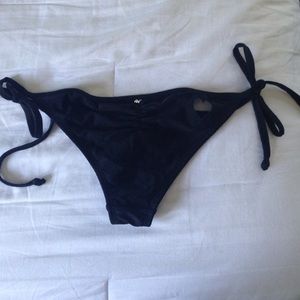 black ruched bikini bottoms with heart cutout
