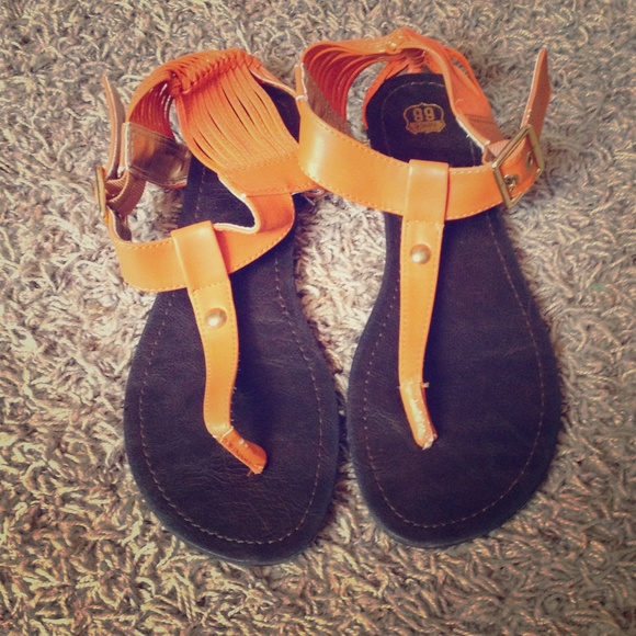Orange backed sandals. Worn once.