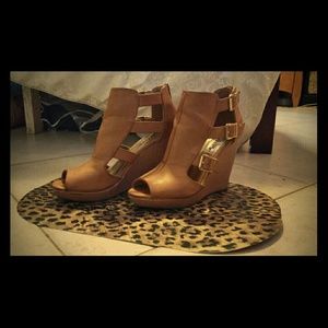 Brown wedges with gold buckled straps