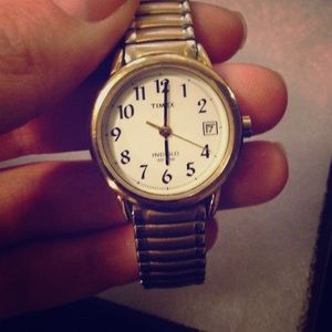 Timex silver and gold watch.