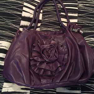 Never used purple purse