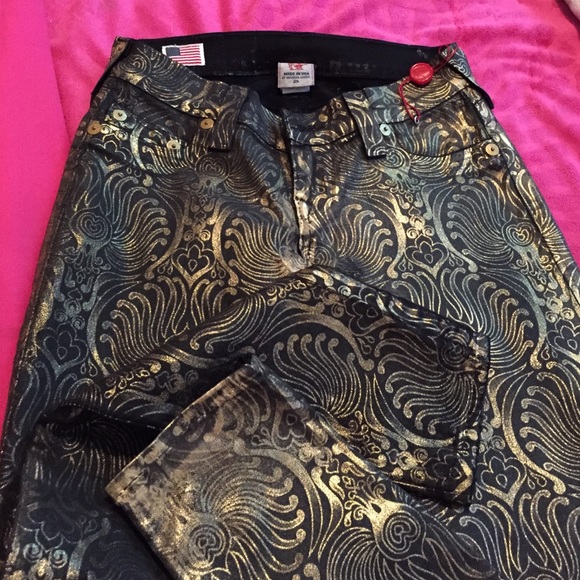 Vintage true religion gold metallic design.