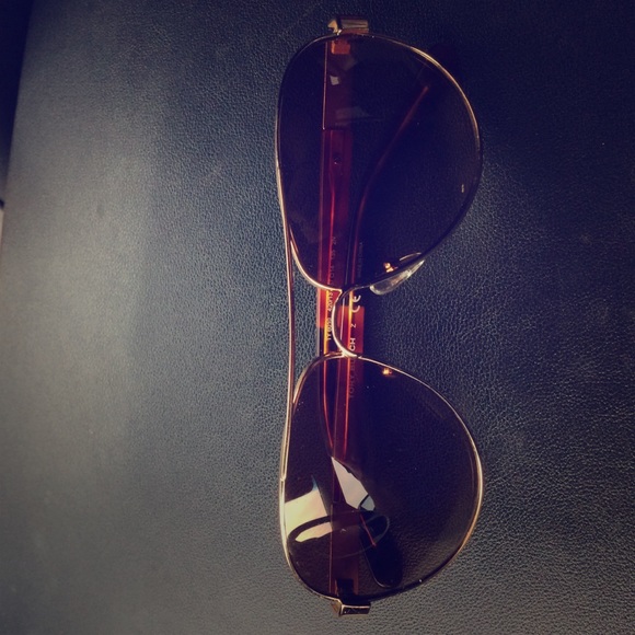 Tory Burch aviators.