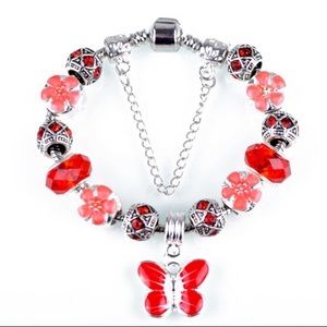RED BUTTERFLY CHARM BRACELET