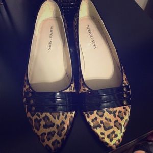 Sleek leopard flats