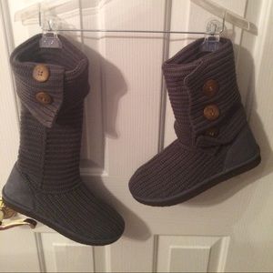 Grey crochet boots.