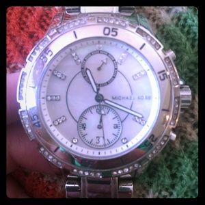 Michael Kors silver watch with Pearl face.