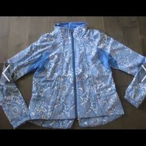 Lululemon travel to track jacket in beachy floral.